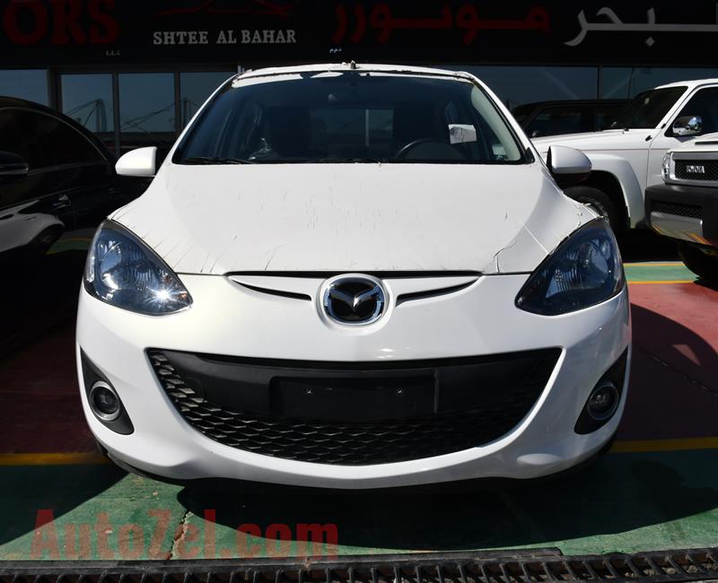 MAZDA 2- 2013- WHITE- ZERO KM- GCC