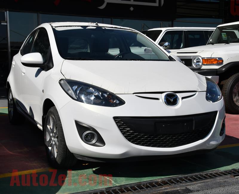 MAZDA 2- 2013- WHITE- ZERO KM- GCC