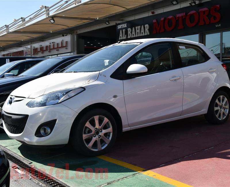 MAZDA 2- 2013- WHITE- ZERO KM- GCC