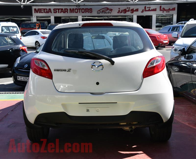 MAZDA 2- 2013- WHITE- ZERO KM- GCC