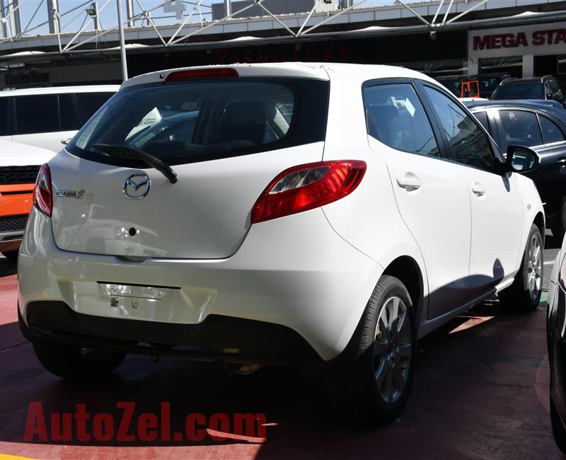 MAZDA 2- 2013- WHITE- ZERO KM- GCC