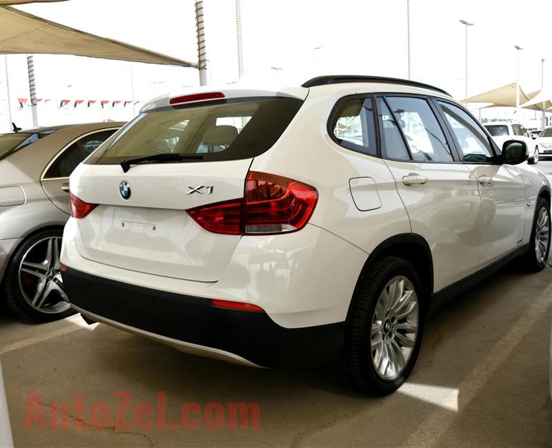 BMW X1- 2011- WHITE- 100 000 KM- GCC SPECS