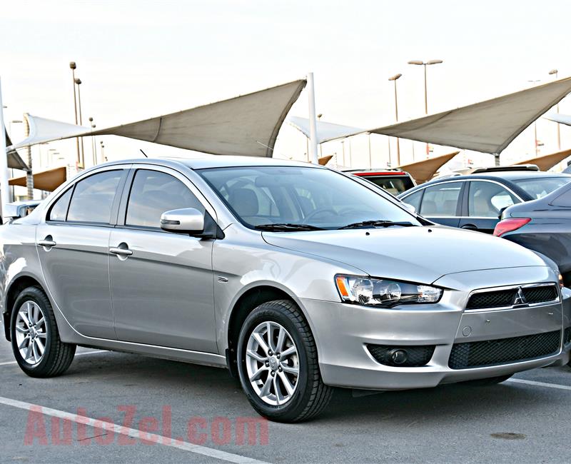 MITSUBISHI LANCER MODEL 2016 - SILVER - 24,000 KM - V4 - GCC 