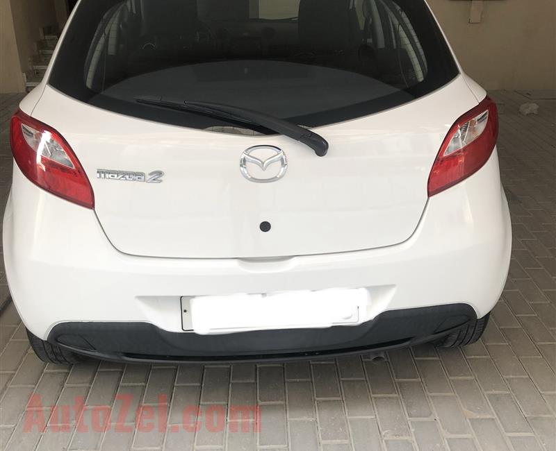 Mazda 2 bought from Gladari ,lady driver with original navigation screen