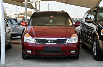 KIA CARNIVAL- 2014- RED- 149 000 KM- GCC SPECS