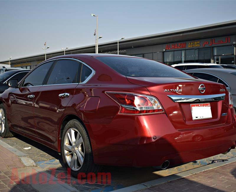 nissan altima model 2013 - red - 250,000 km - v6 - gcc 