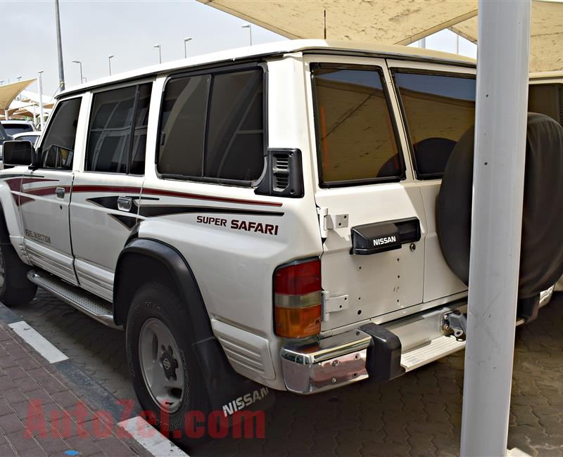 NISSAN SUPER SAFARI MODEL 1995 - 280,000 KM - WHITE - V6 - GCC 