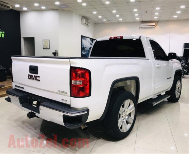 GMC Sierra SLE - 2015- WHITE- 129 000 KM - GCC - ONE YEAR WARRANTY- ( 1,200 AED PER MONTH ) 