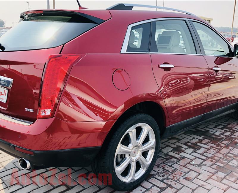 Cadillac SRX4 2014 very good condition warranty from aaa 1yaer 