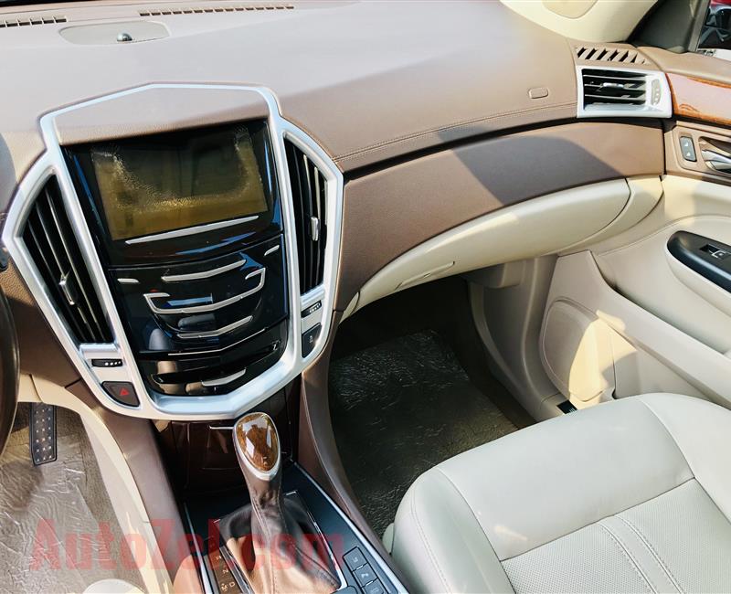 Cadillac SRX4 2014 very good condition warranty from aaa 1yaer 