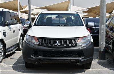 MITSUBISHI L200 PICK UP- 2016- WHITE- 180 000 KM- GCC