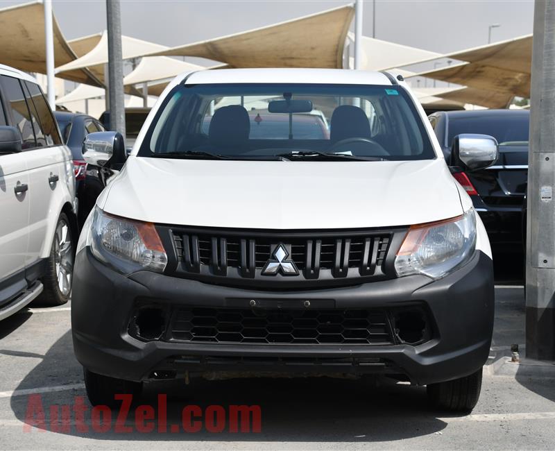 MITSUBISHI L200 PICK UP- 2016- WHITE- 180 000 KM- GCC