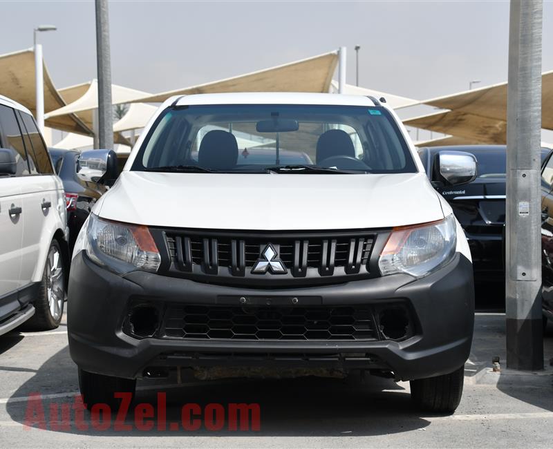 MITSUBISHI L200 PICK UP- 2016- WHITE- 180 000 KM- GCC