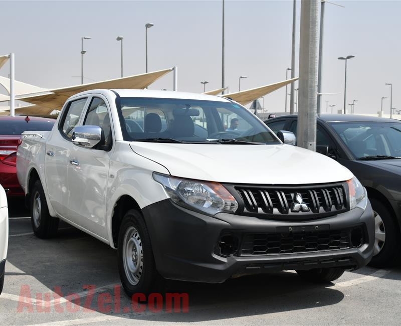 MITSUBISHI L200 PICK UP- 2016- WHITE- 180 000 KM- GCC