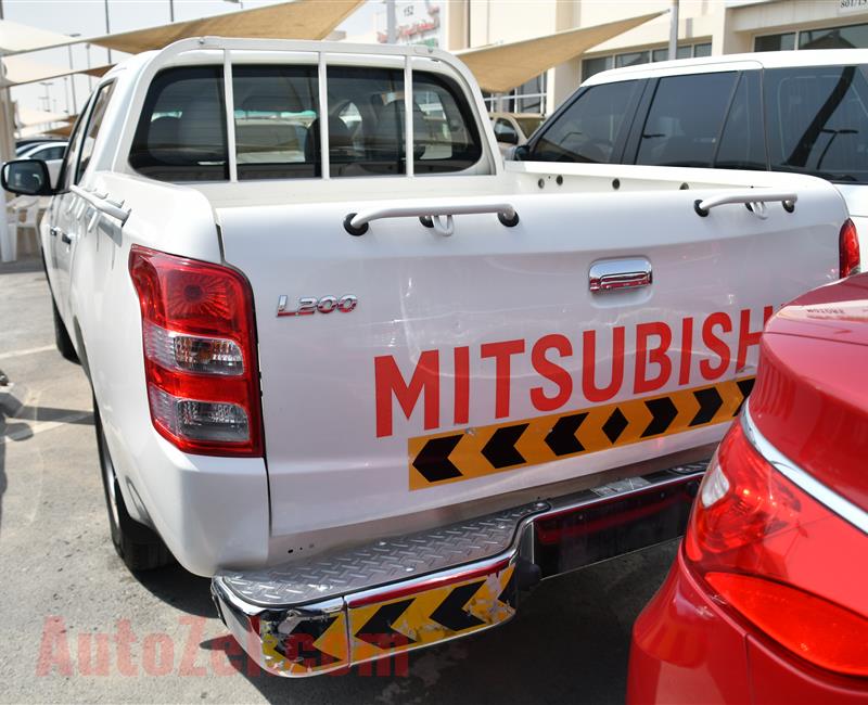 MITSUBISHI L200 PICK UP- 2016- WHITE- 180 000 KM- GCC