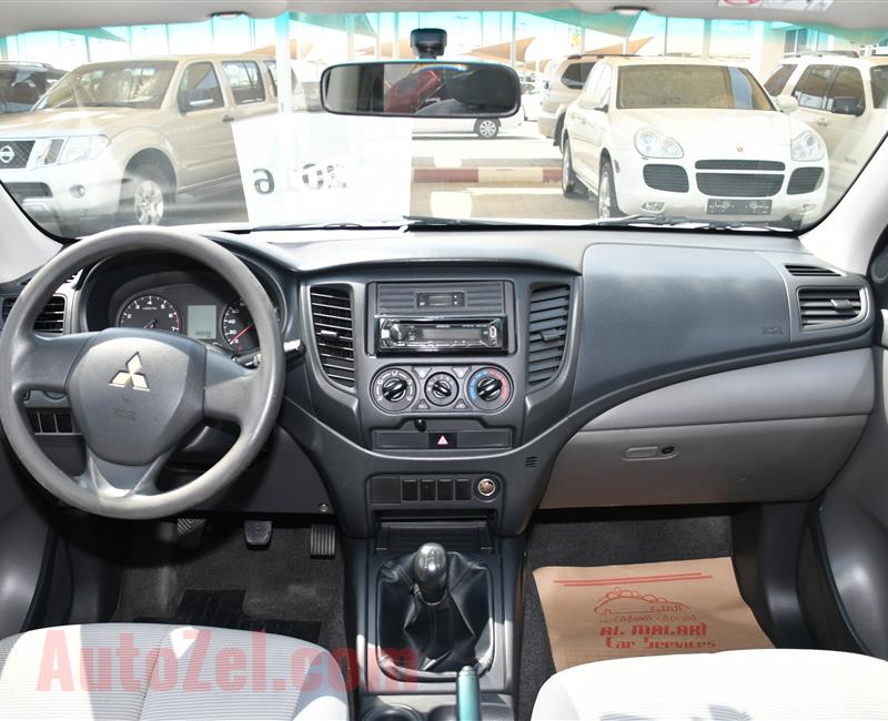 MITSUBISHI L200 PICK UP- 2016- WHITE- 180 000 KM- GCC