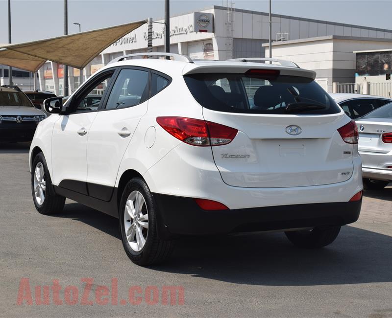 HYUNDAI TUCSON LIMITED- 2014- WHITE- 152 000 KM- GCC SPECS