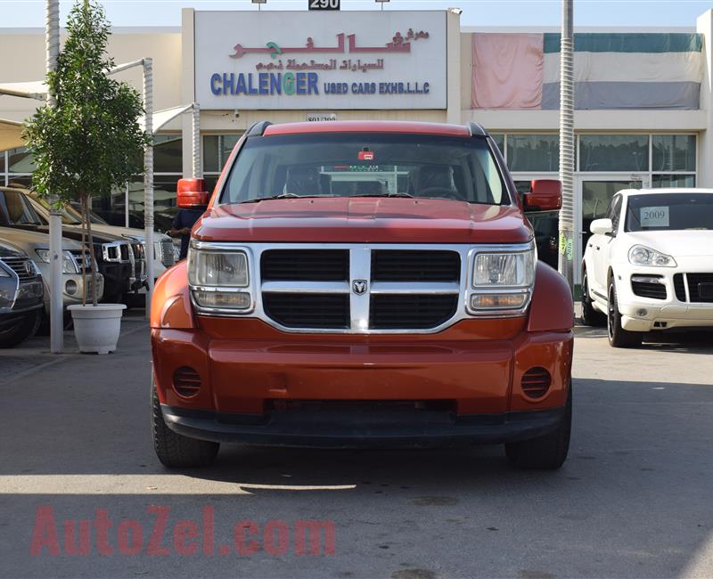 DODGE NITRO 4X4- 2007- ORANGE- 221 000 KM- GCC SPECS- CALL FOR THE PRICE