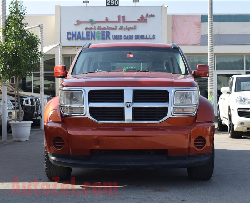 DODGE NITRO 4X4- 2007- ORANGE- 221 000 KM- GCC SPECS- CALL FOR THE PRICE