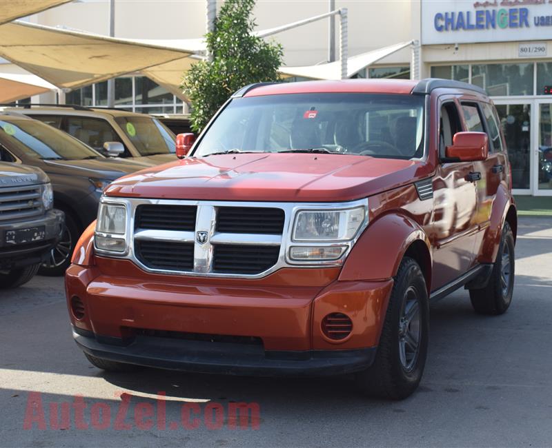 DODGE NITRO 4X4- 2007- ORANGE- 221 000 KM- GCC SPECS- CALL FOR THE PRICE