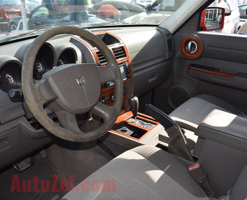 DODGE NITRO 4X4- 2007- ORANGE- 221 000 KM- GCC SPECS- CALL FOR THE PRICE