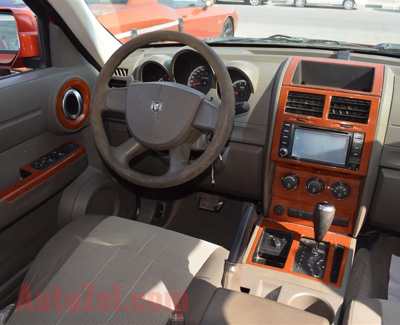 DODGE NITRO 4X4- 2007- ORANGE- 221 000 KM- GCC SPECS- CALL FOR THE PRICE