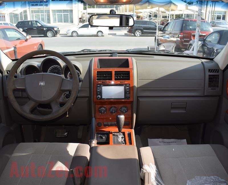 DODGE NITRO 4X4- 2007- ORANGE- 221 000 KM- GCC SPECS- CALL FOR THE PRICE