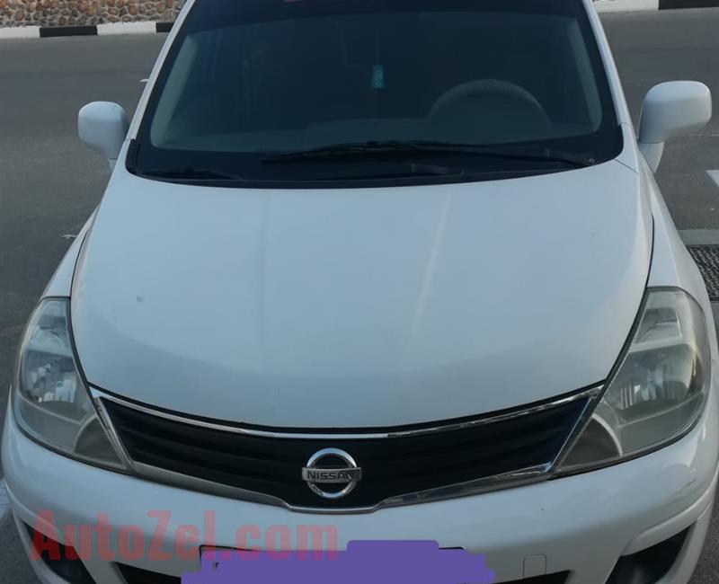 NISSAN TIIDA 1.8 SEDAN, GCC SPEC, WHITE CLR, 2011 MODEL, GOOD CONDITION. 