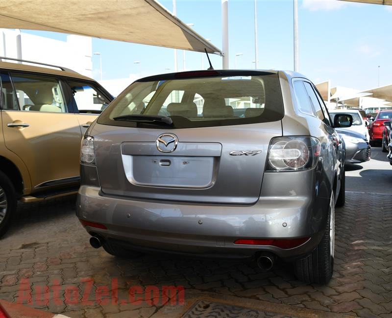 MAZDA CX7 MODEL 2010 - GREY - 176000 KM - V6 - GCC 