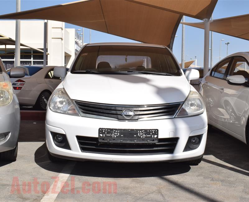 NISSAN TIIDA- 2013- WHITE- 100 000 KM- GCC SPECS