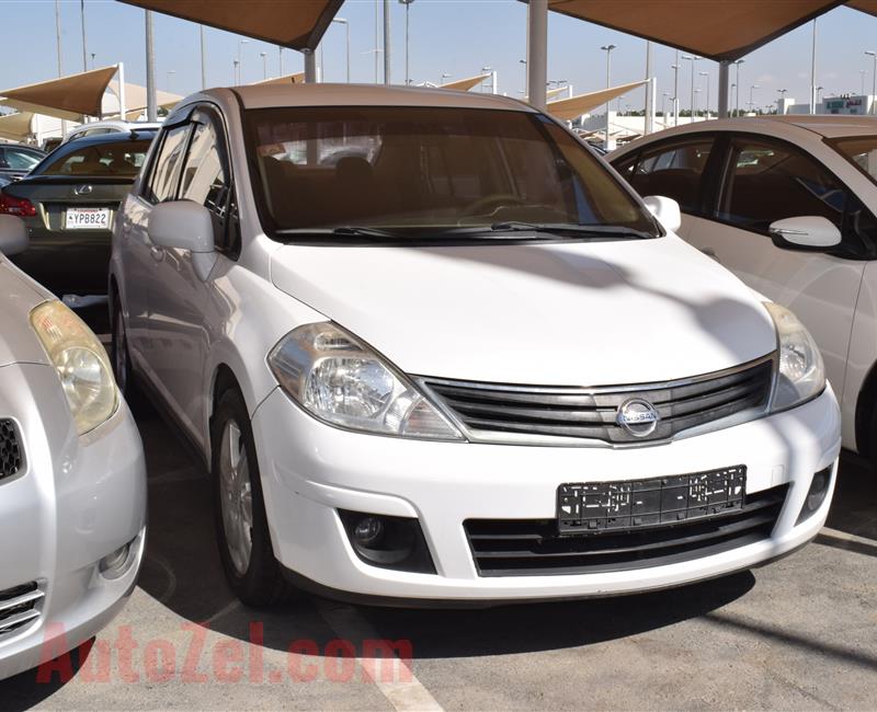 NISSAN TIIDA- 2013- WHITE- 100 000 KM- GCC SPECS