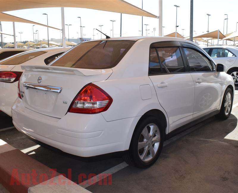 NISSAN TIIDA- 2013- WHITE- 100 000 KM- GCC SPECS