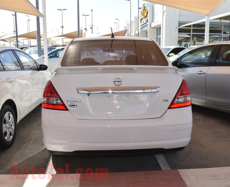 NISSAN TIIDA- 2013- WHITE- 100 000 KM- GCC SPECS