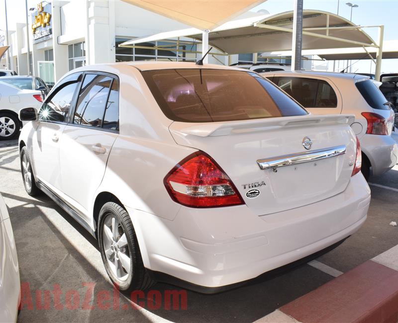 NISSAN TIIDA- 2013- WHITE- 100 000 KM- GCC SPECS