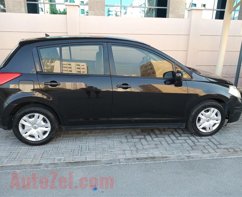 TIIDA Hatchback - Black Color - Model - 2011