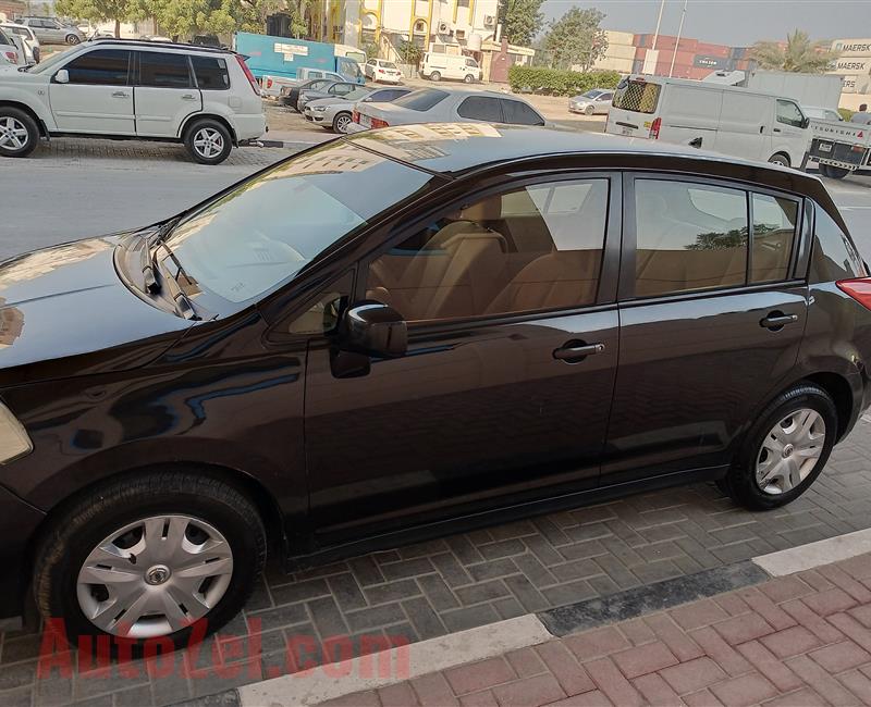 TIIDA Hatchback - Black Color - Model - 2011