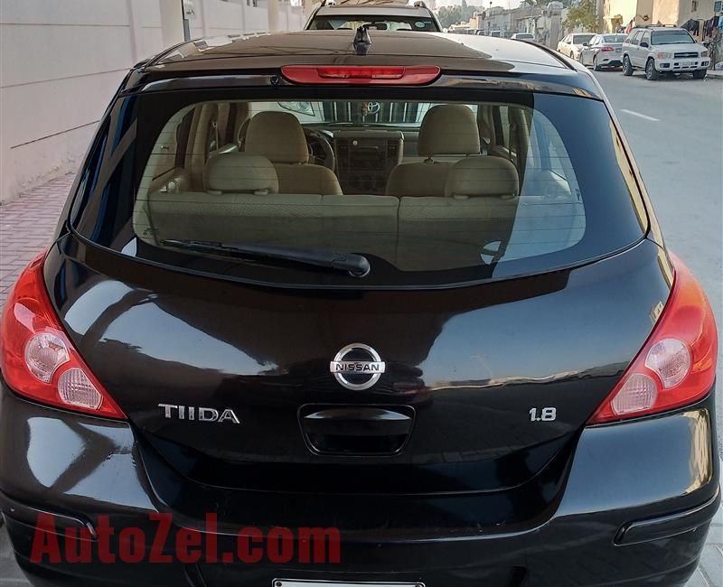 TIIDA Hatchback - Black Color - Model - 2011