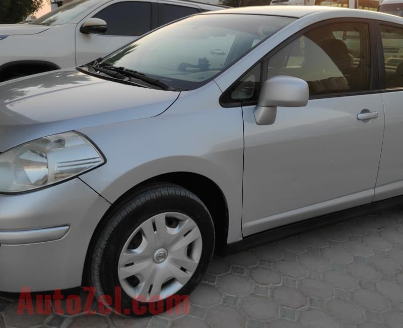 Urgent sale Nissan Tiida 2012,1.8L AED 11000