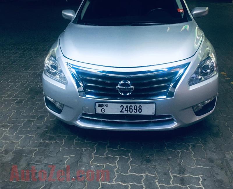Nissan Altima for sale 2015 with amount 22000 aed , The price is negotiable ,89000 kilometers, contact no 0569656600 