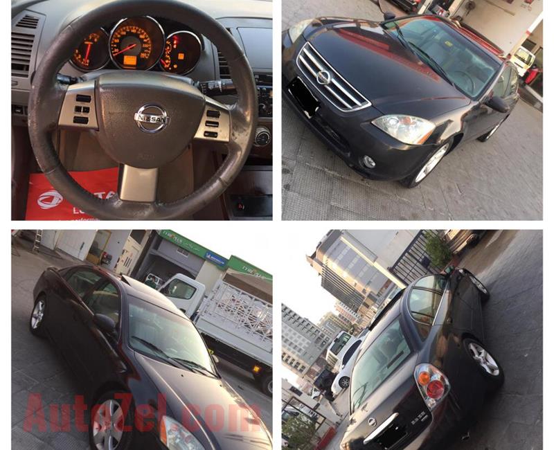 Nissan Altima v6 2006 black color full options sunroof cruse controls  Chassis garante  8000 AED 0585596030