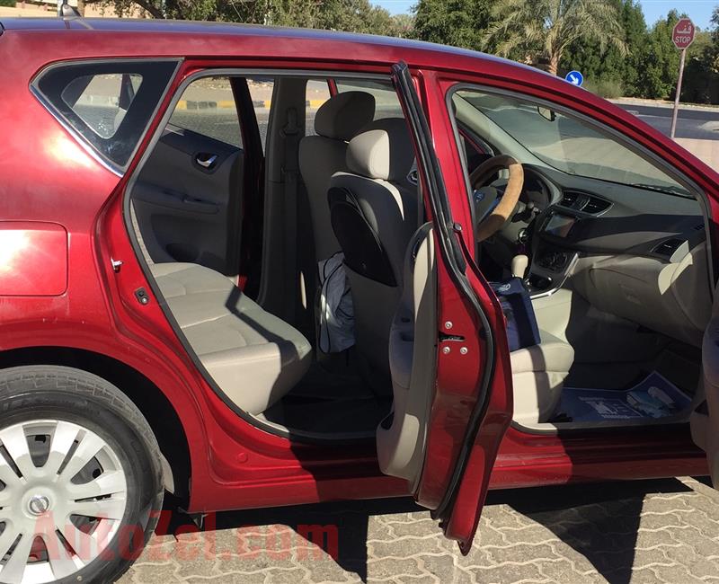 Lady Doctor owned, Red color Nissan Tiida hatchback, 1.6 engine capacity, 45000 km