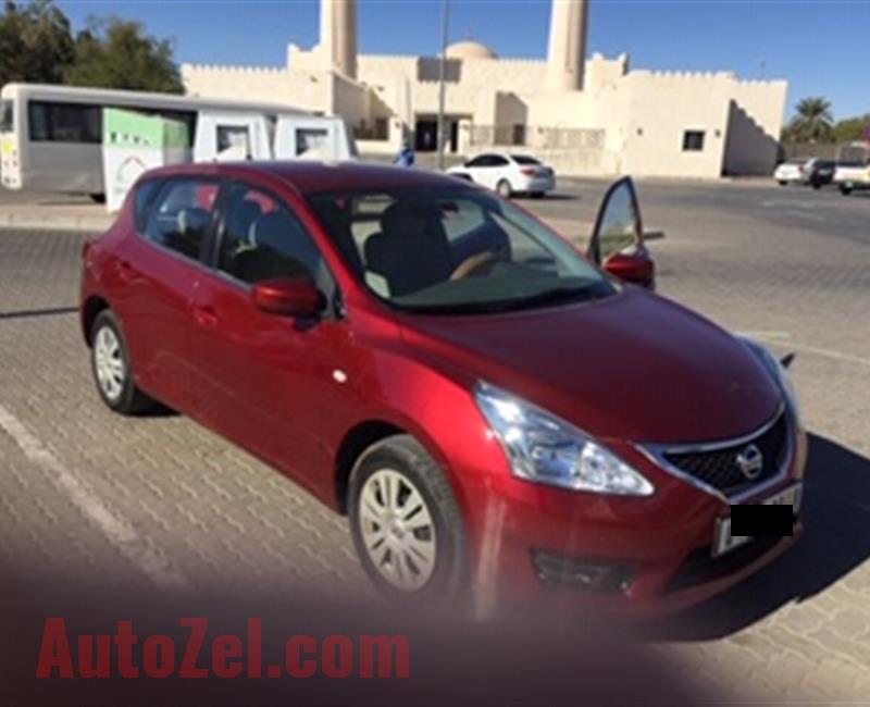 Lady Doctor owned, Red color Nissan Tiida hatchback, 1.6 engine capacity, 45000 km