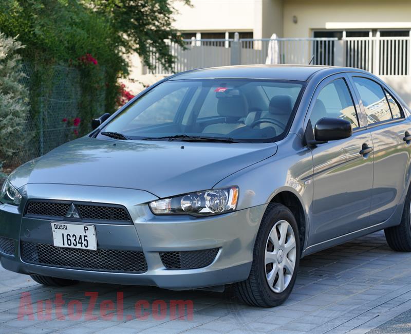 Mitsubishi Lancer EX, GCC Model 2015, 1.6L, millage: 68,000km, first owner, accident free, original paint