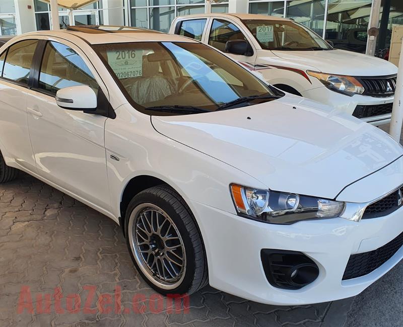 ميتسوبيشي لانسر Mitsubishi Lancer EX 2016 GLS- FULL OPTIONS FREE ACCIDENT