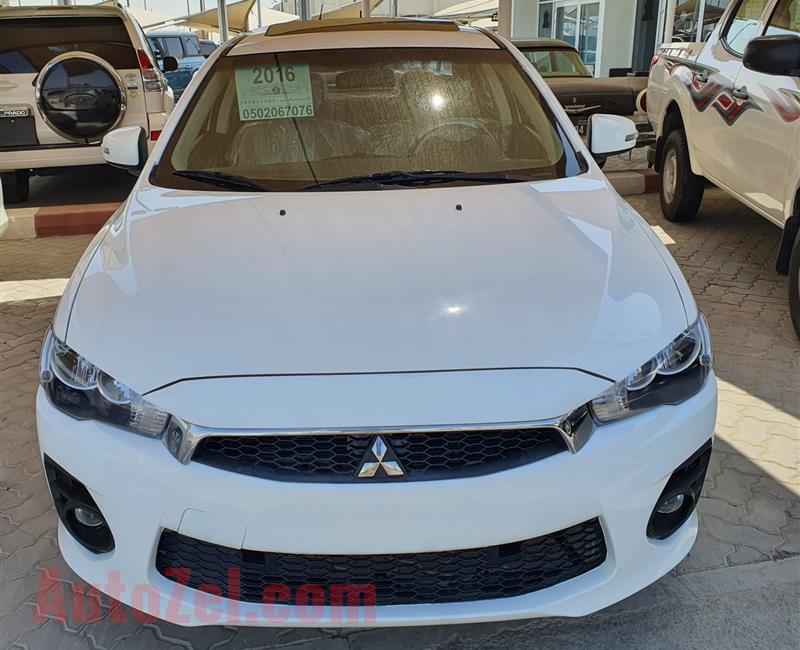 ميتسوبيشي لانسر Mitsubishi Lancer EX 2016 GLS- FULL OPTIONS FREE ACCIDENT