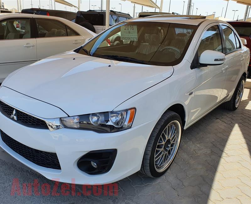 ميتسوبيشي لانسر Mitsubishi Lancer EX 2016 GLS- FULL OPTIONS FREE ACCIDENT