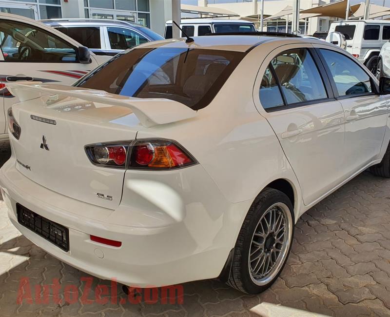 ميتسوبيشي لانسر Mitsubishi Lancer EX 2016 GLS- FULL OPTIONS FREE ACCIDENT