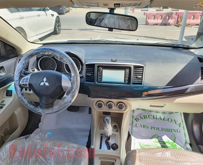 ميتسوبيشي لانسر Mitsubishi Lancer EX 2016 GLS- FULL OPTIONS FREE ACCIDENT