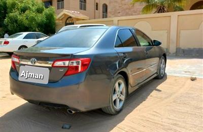 Toyota Camry 2014 American specs. 4-Cylinder Fuel economy...